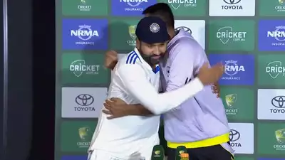 two men hugging each other